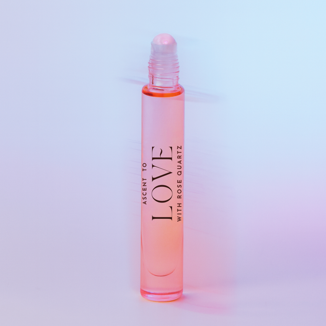 Roll-on bottle labeled 'LOVE' with rose quartz on a gradient background